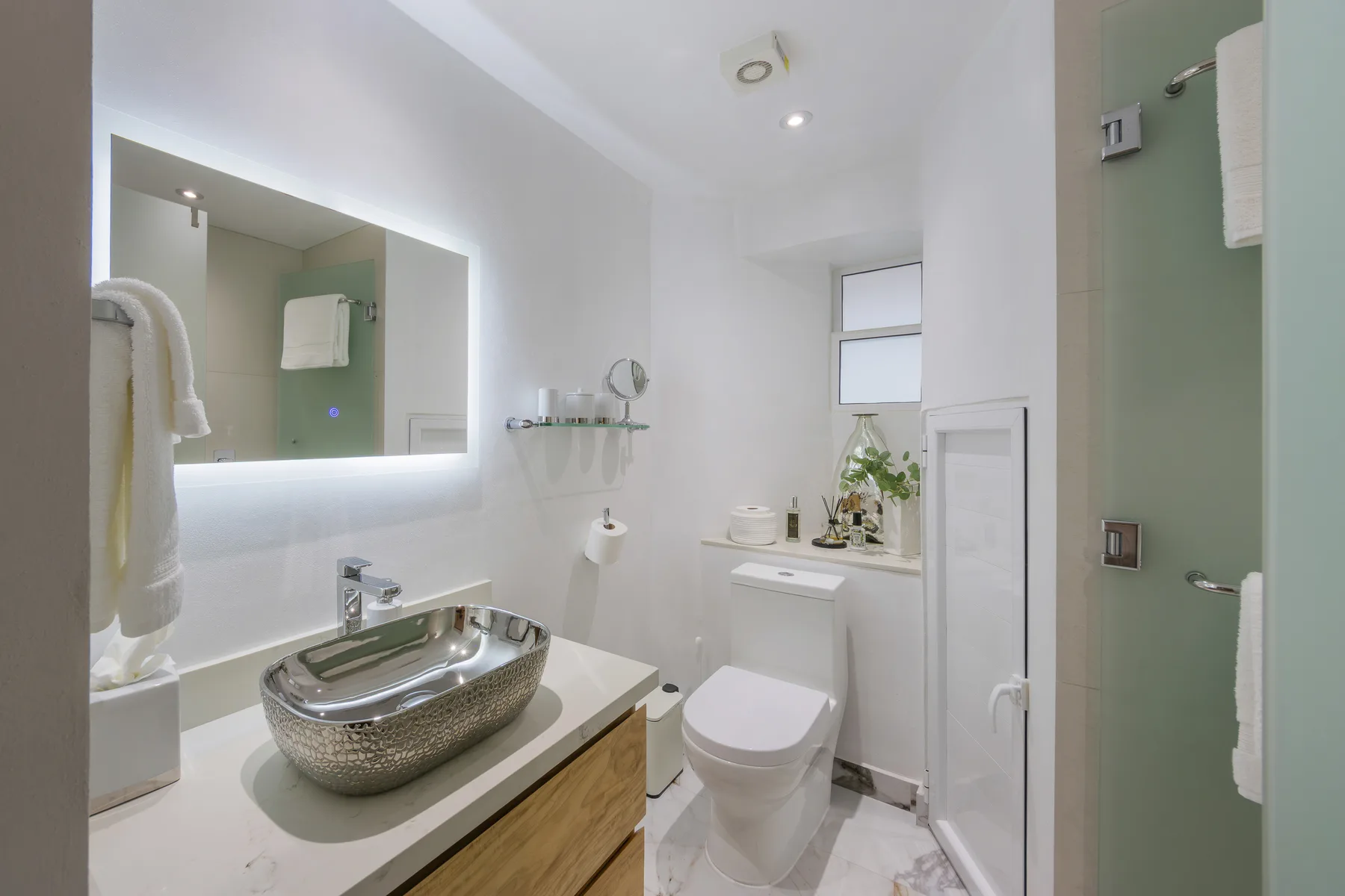 Guest bathroom with vessel sink and walk-in shower